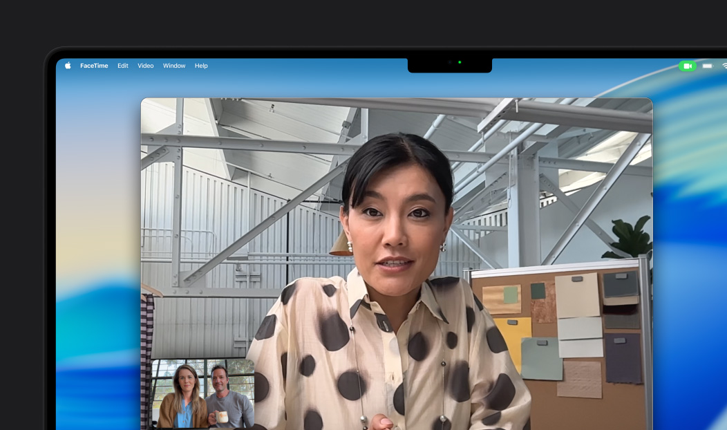 A video call on MacBook Pro, a woman talks to two people on the call, Center Stage keeps her centered in the frame